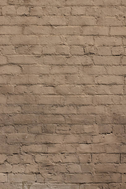 istock Part of a muddy old brick wall 1392067954