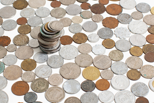 A Flat Lay background of Japanese Coins isolated on a white background with copy space.