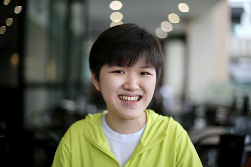 Portrait of an Asian teenage girl.