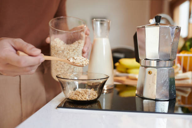 istock Man Cooking Oatmeal 1392075858