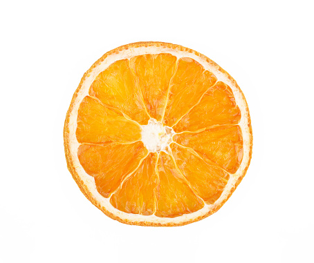 Close up shot of a fresh orange on a white background. \nShot with 100mm Macro lens.