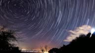 istock Star trail time lapse over the sea in Ceuta, Spain 1392080589