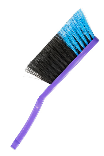 Hand sweeping brush isolated on white background