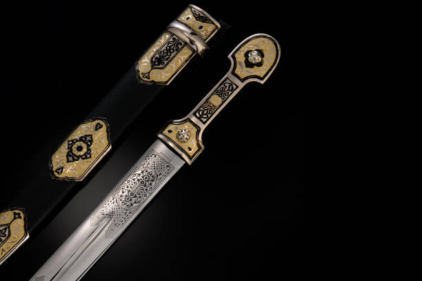 istock collectible silver dagger with scabbard on black 1392085260