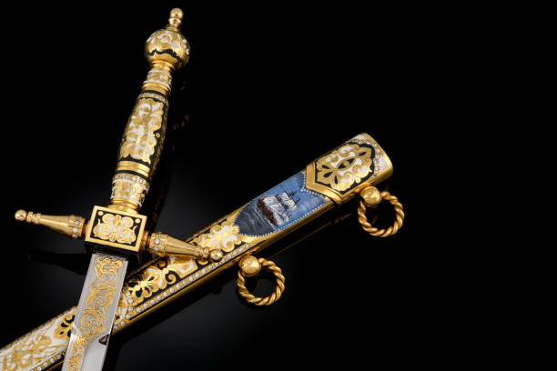 istock collectible silver dagger with scabbard on black 1392085344