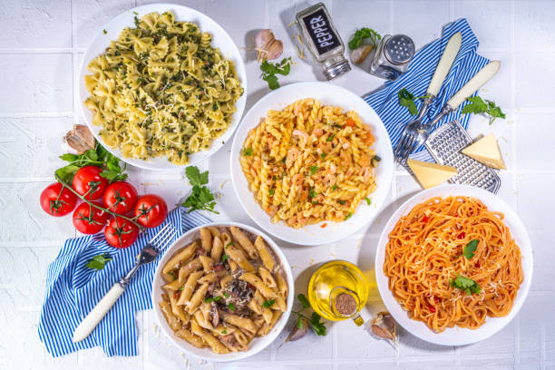 istock Set of pasta with different sauces 1392087171