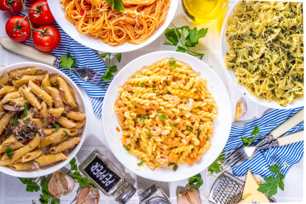 istock Set of pasta with different sauces 1392087298