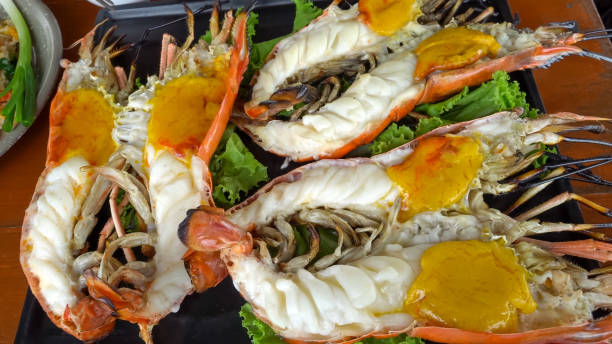 istock Thai food. Giant freshwater prawn curry.  Fried River shrimp 1392088644