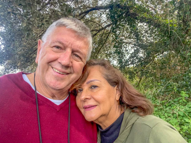 istock Senior mixed ethnicity couple close portrait 1392090629