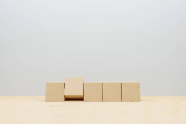 istock business and education concept. wooden cubes on table. space for text. 3D illustration 1392094316