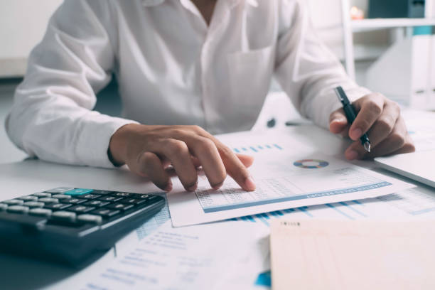 istock Businessman is thinking and analyse planing the strategy. 1392094765