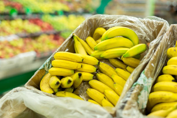 istock Bananas in the boxes in the supermarket. 1392096557