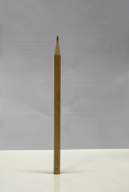istock Brown wooden pencil is located, looks old 1392099000