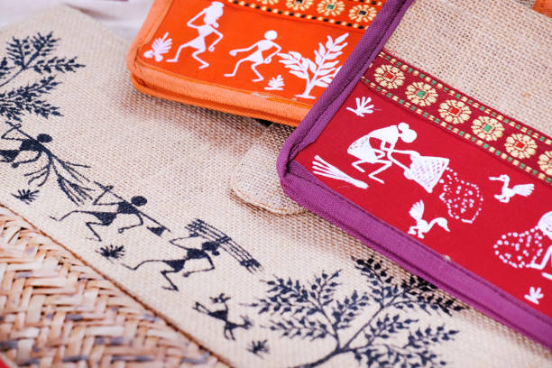 istock hand-made notebooks, Files with Warli painting pattern, hand drawn traditional the ancient tribal art India. 1392110623