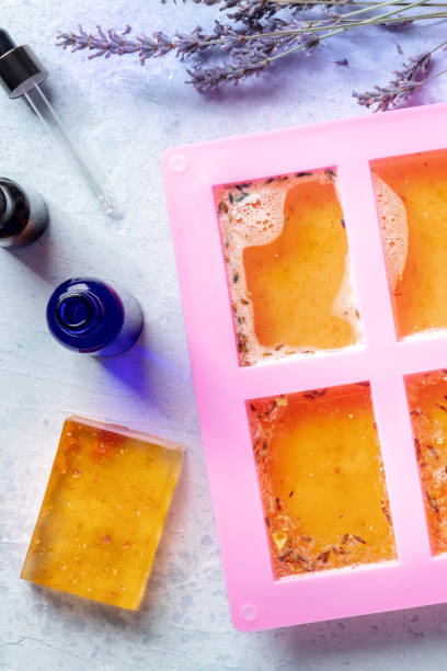 istock Homemade soapmaking. Liquid glycerin based soap with natural additives 1392110842