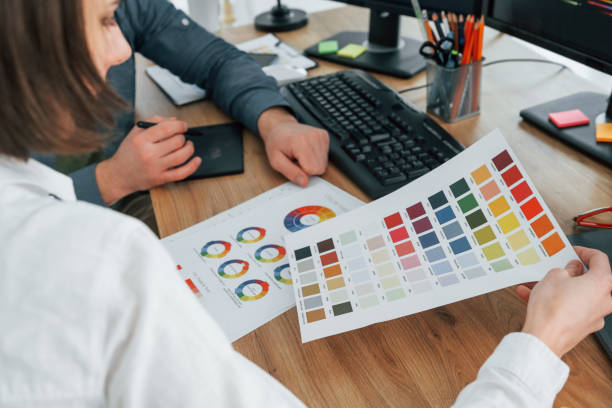 istock Creative occupation. Two designers working together in the office 1392110869