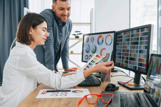 istock Development of the product. Two designers working together in the office 1392111503