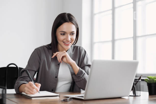 istock Woman working in office, has meeting online 1392114734