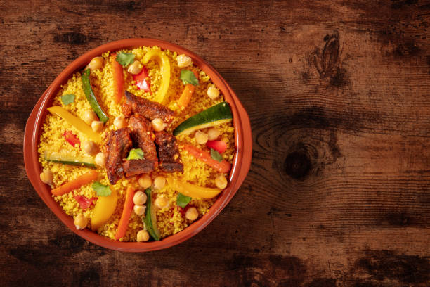 istock Meat and vegetable couscous in a bowl, typical food from Morocco 1392116080
