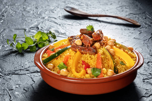istock Meat and vegetable couscous in a bowl, typical food from Morocco 1392116092