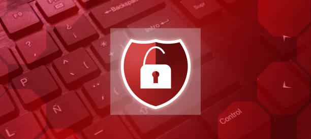 istock Keyboard background with red lights and security shield attacked. Internet of things. 1392117358