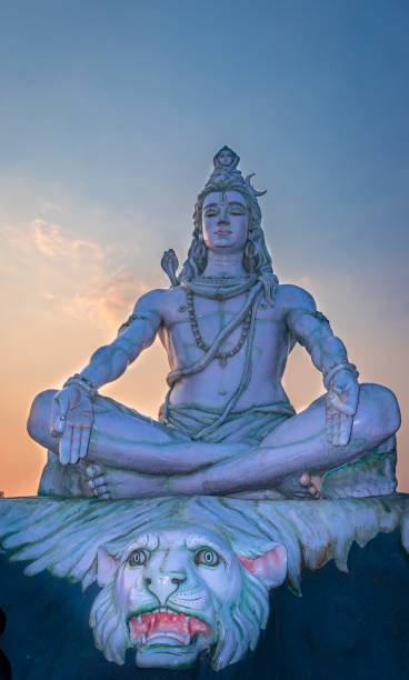 istock hindu god lord shiva statue in meditation posture with dramatic sky at evening from unique angle 1392117980