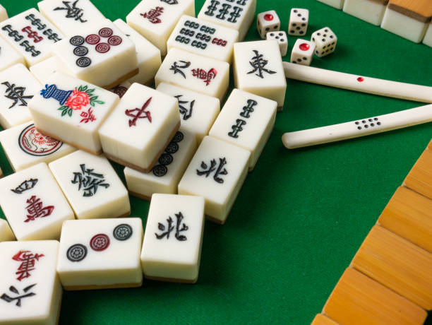 istock The mahjong on table ancient asian board game close up image 1392119863