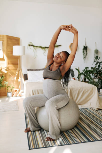 istock Woman doing exercises during pregnancy 1392125250