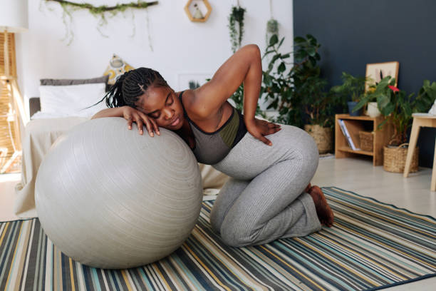 istock Pregnant young woman having contractions 1392125266
