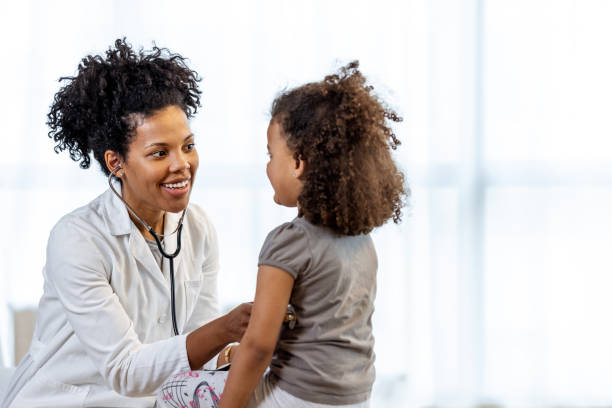 istock Listening to a Child's Heartbeat 1392128452