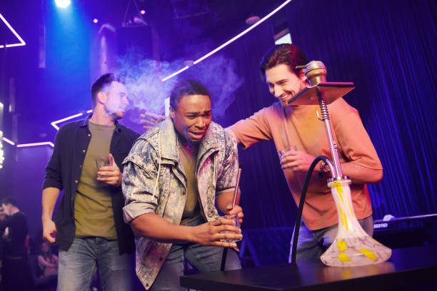 istock Three friends having fun in the night club together 1392132225