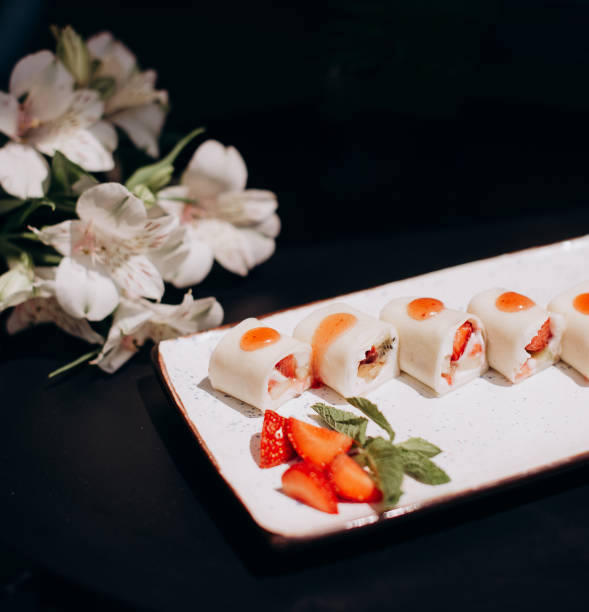 istock Fruit sushi, sushi roll with strawberry and mango 1392133655