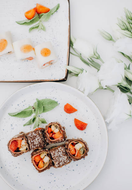 Fruit sushi, sushi roll with strawberry and mango