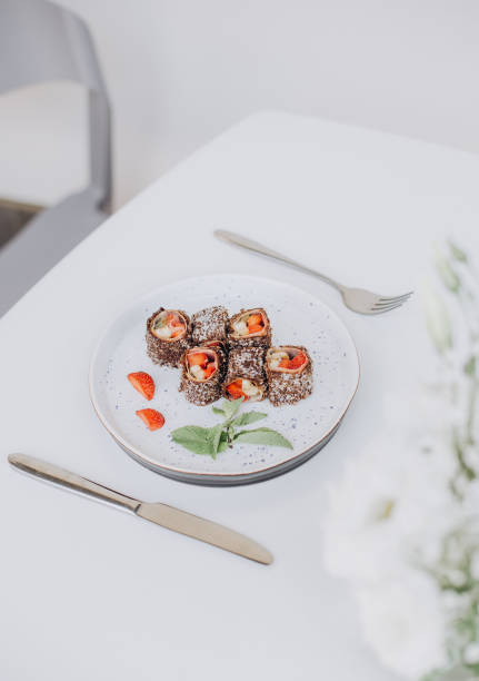 istock Fruit sushi, sushi roll with strawberry and mango 1392133660