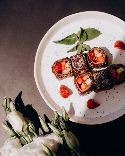 istock Fruit sushi, sushi roll with strawberry and mango 1392133661