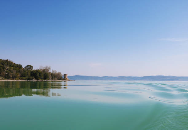 The photo was taken at Lake Trasimeno on a spring day and shows the approach by ferry to the beautiful Isola Maggiore.
