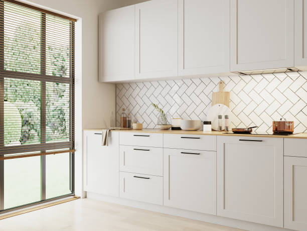 istock home kitchen interior with garden view window in white colours, 3d rendering 1392136775