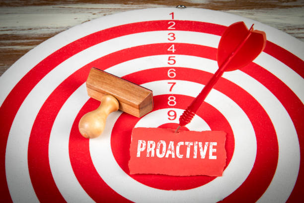 istock Proactive. Note and dart in the center of the target 1392138350