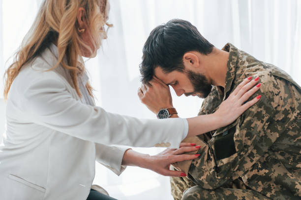istock Horrible memories. Soldier have therapy session with psychologist indoors 1392138363