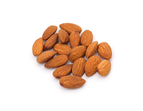 istock Heap of dried almond kernels. 1392140803