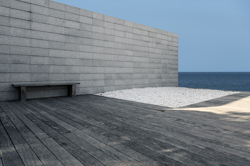 Abstract Stone Building Background Wall and light effect by the sea