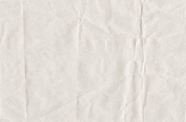 Crumpled white paper background stock photo