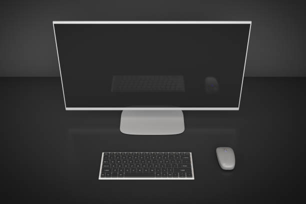 istock Computer monitor, keyboard and mouse on the table 1392144981