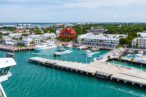 View of the cruise ship pier, the adjacent marina and commercial center with the city of Key West, Florida in the background as seen from our Cruise Ship