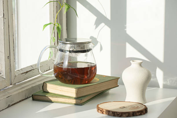 istock teapot in front of white window 1392149814
