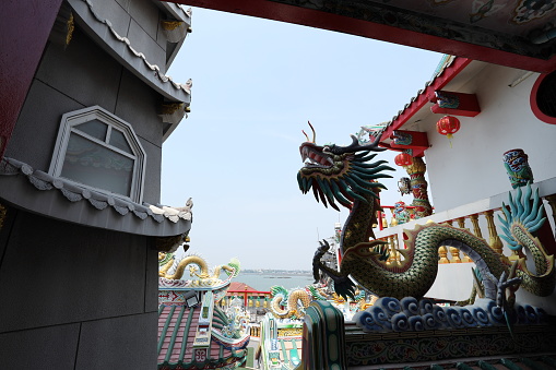 Chonburi, Thailand - April 8, 2022: The Chinese temple at Khao Sam Muk in Chonburi Province, Thailand. It is the beautiful sightseeing for many tourist.