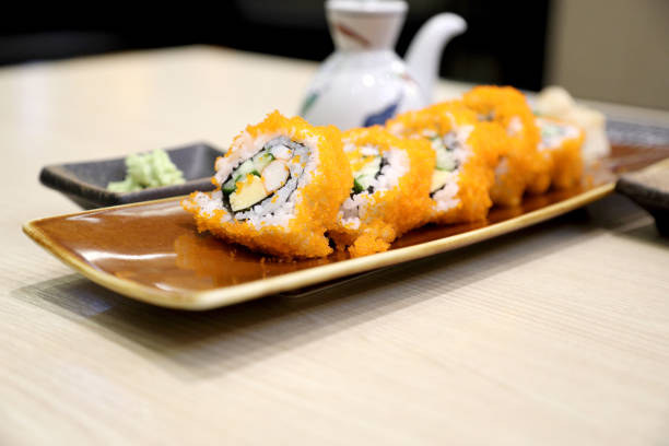 home made food avocado sushi rolls on kitchen table white rustic background environment interior space