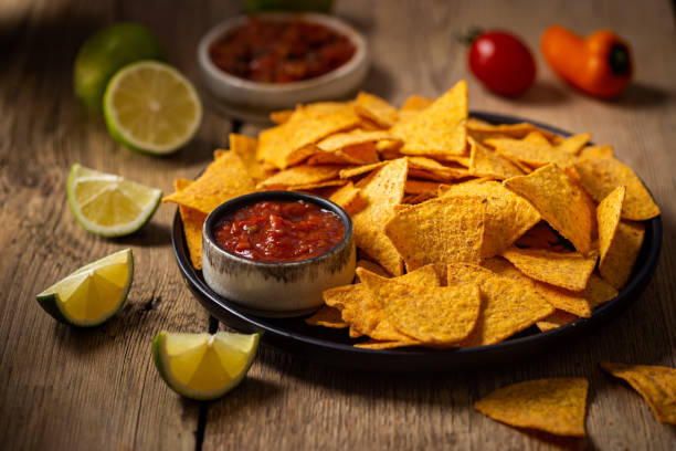 bowl of nachos chips - tortilla chip imagens e fotografias de stock