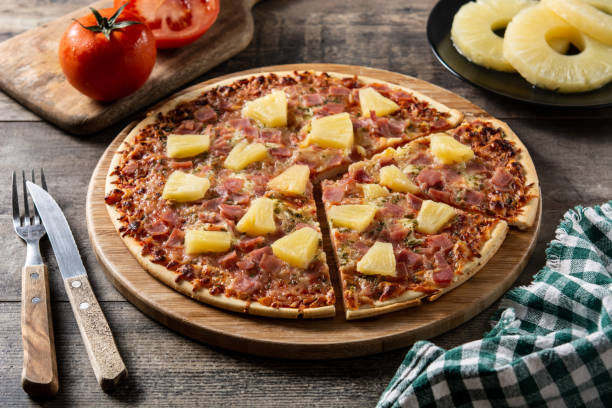 istock Hawaiian pizza with pineapple,ham and cheese 1392158705
