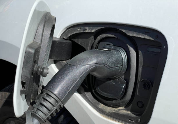 istock EV connector plug charging an electric car 1392158837